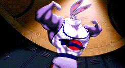 Animated gif of bugs bunny showing his muscles in a hyperbolic way